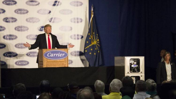 Then-President-elect Donald Trump addresses workers at the Indianapolis Carrier factory last December. - Drew Daudelin/WFYI