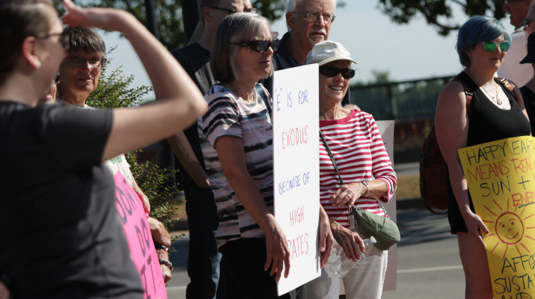 The coalition Energy for All gathered near the CenterPoint office building in Evansville to protest the rate increases and carbon emissions that will likely result from the two new gas plants. - Tim Jagielo/WNIN