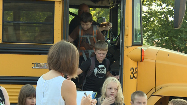 Kids getting off a school bus  - WFIU/WTIU