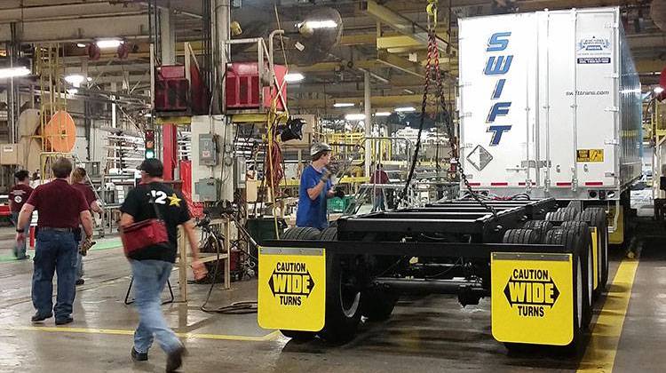 Workers assemble truck trailers at Wabash National's Lafayette factory. - Annie Ropeik/Indiana Public Broadcasting