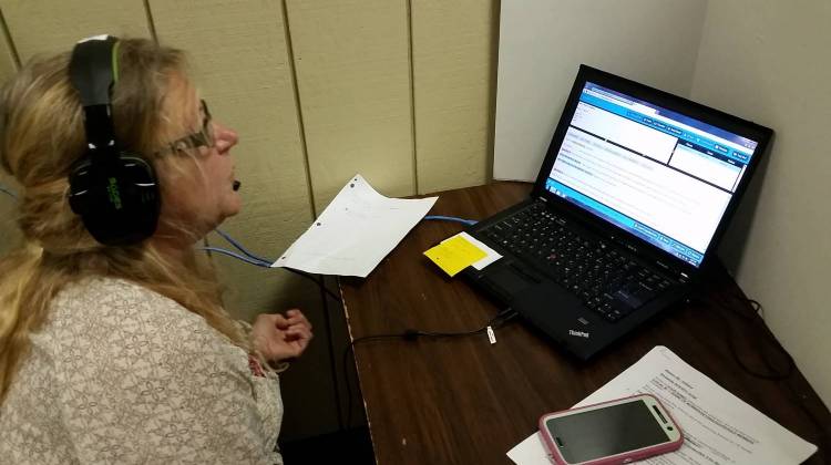 Terri Mutran calls fellow United Auto Workers members about the upcoming election at a union phone bank in Kokomo. - Annie Ropeik/IPBS