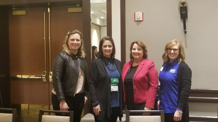 Left to Right) Indiana farmers Leah Beyer, Susan Brocksmith, Joyce Kron and Kelly Whiteman Snipes discuss life as a women in the ag industry during a panel session at the Indiana Young Farmer and Ag Professionals Conference. - Samantha Horton/IPB News