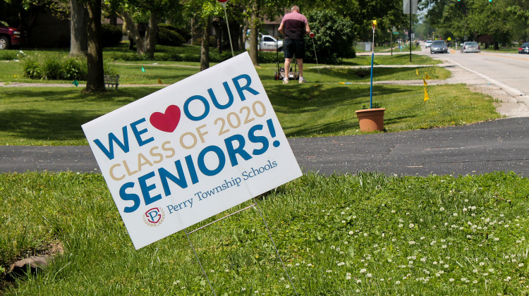 Schools across Indiana are doing what they can to celebrate seniors and the graduating class of 2020, including distributing or creating signs for people to post in their yards and communities. - Lauren Chapman/IPB News