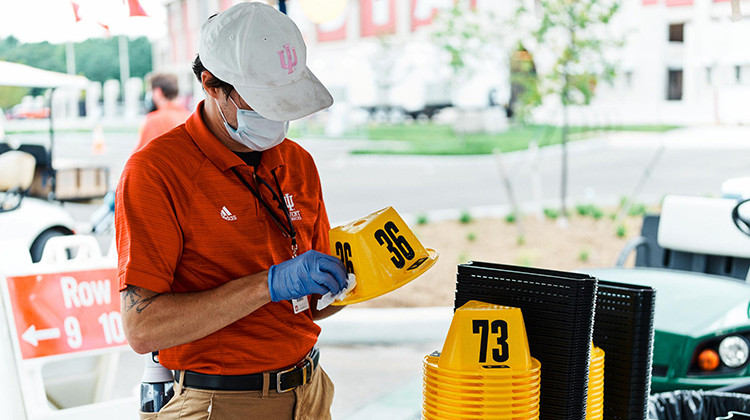 Worker stands at a COVID-19 testing center at IU Bloomington on Sunday, Aug. 9, 2020. - Eric Rudd/Indiana University