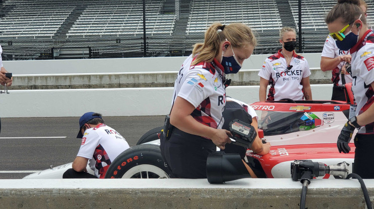 Paretta Autosport crew members work on the no. 16 car during a practice session ahead of this year's Indianapolis 500.  - Samantha Horton/IPB News