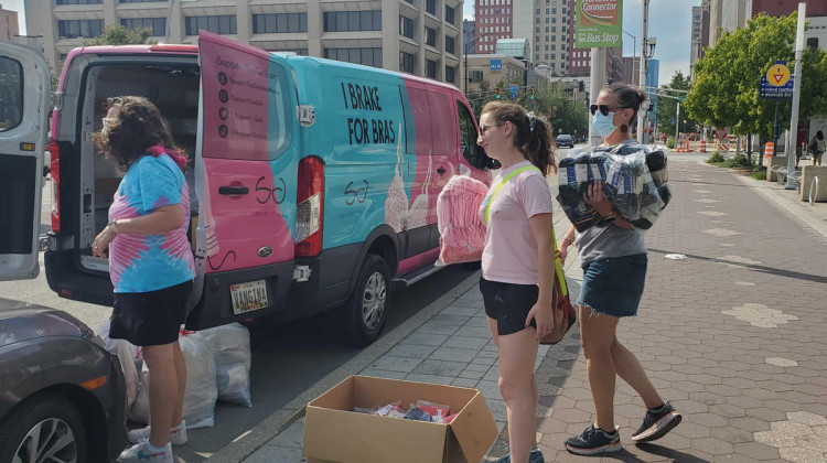 The I Support The Girls team unloads the Vangina with hundreds of products including bras, underwear and menstrual products to hand out to homeless women in downtown Indianapolis. - Samantha Horton/IPB News