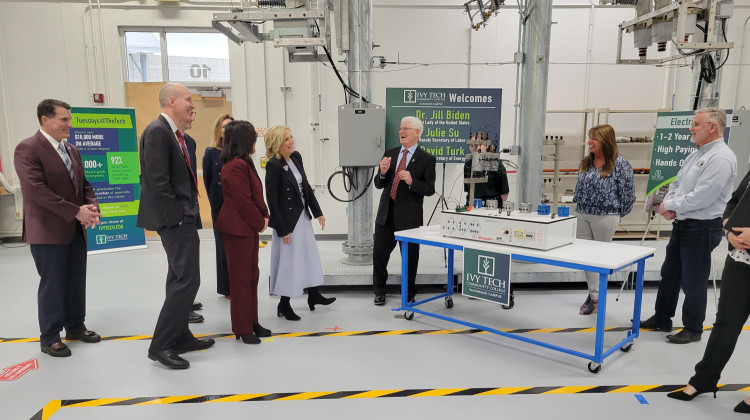 First Lady Jill Biden learns about Ivy Tech's electric line technology program during a visit to Valparaiso Monday. - Michael Gallenberger / Lakeshore Public Radio