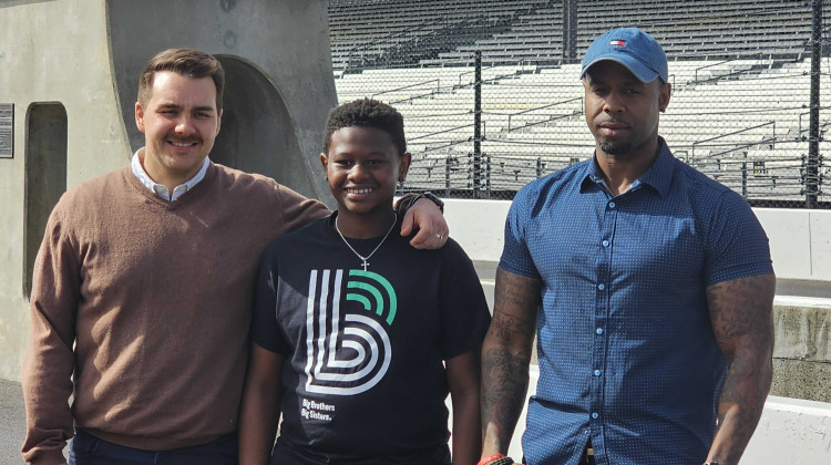 The partnership hopes to attract 500 mentors to sign up with Big Brothers Big Sisters of Central Indiana. (From left to right: Zach Hall, the Big; Ty, the Little; Tyler, Ty’s father) - Jeremy Reuben / WFYI
