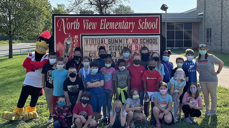 MCS students pose with Ball State's Charlie Cardinal outside North View Elementary School. - File Photo: Muncie Community Schools on Facebook