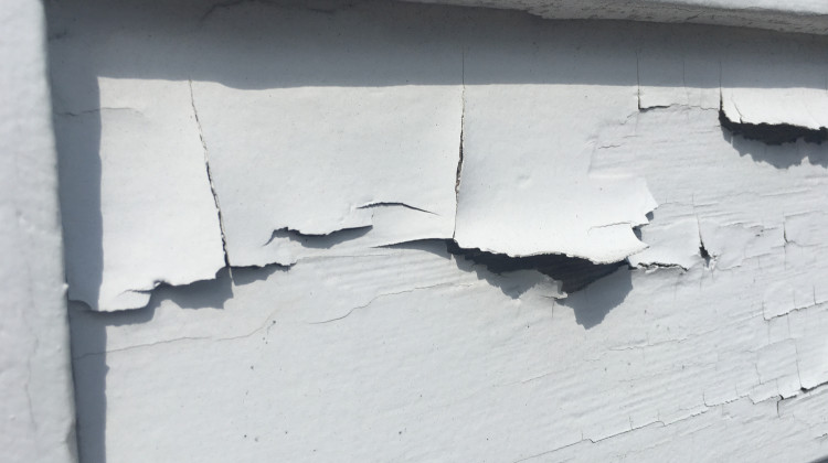 Lead paint peeling off the side of a home.  - Mike Mozart/Flickr