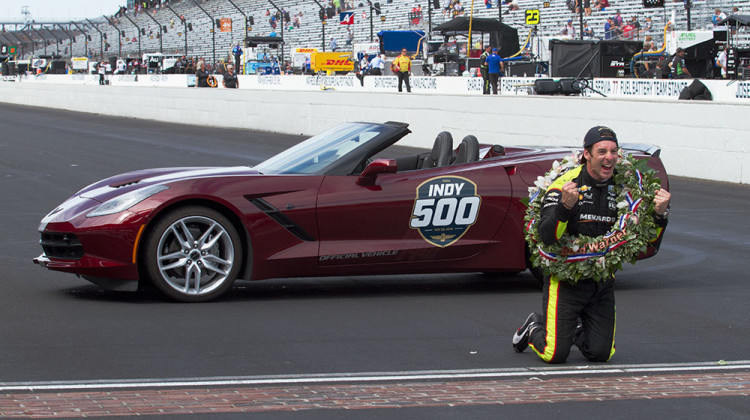 Simon Pagenaud celebrates at the yard of bricks after winning the Indianapolis 500 on Sunday, May 26, 2019. - Doug Jaggers/WFYI