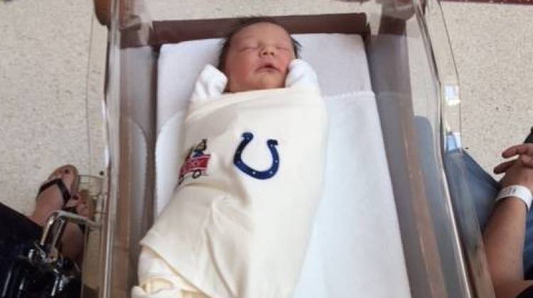 A newborn at IU Health North hospital sports the new sleep sack that will be given to mothers.