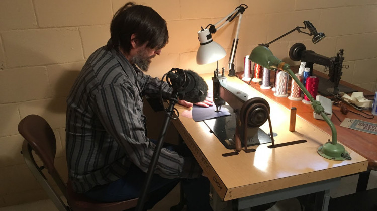 Western wear designer Jerry Lee Atwood works in his basement studio - Melissa Davis/WFYI