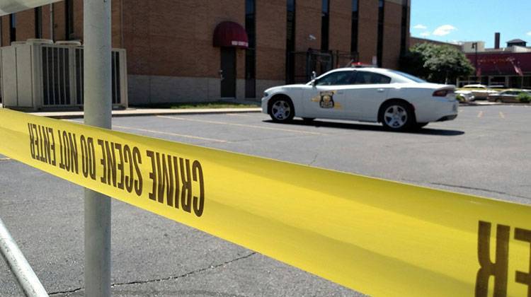 Crime scene tape surrounded the parking lot as the FBI raided the Vigo County School Corporation offices in Terre Haute in June. - Harrison Wagner/WFIU-WTIU