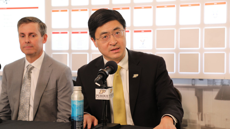 Lilly CEO David Ricks (left) and Purdue President Mung Chiang (right) announced a $250 million partnership on Friday. - Ben Thorp / WFYI