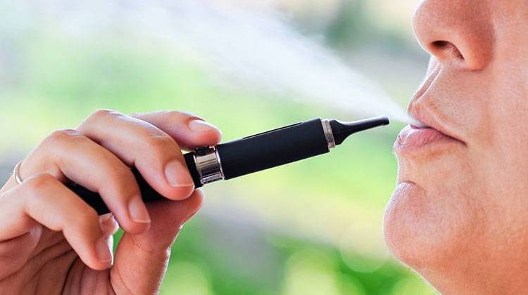 Indianaâ€™s new e-liquids regulations will go into effect July 1. - stock photo