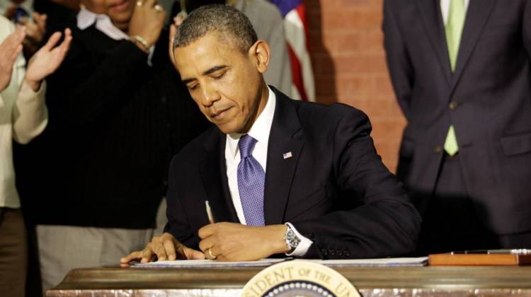 Wielding A Pen And A Phone, Obama Goes It Alone