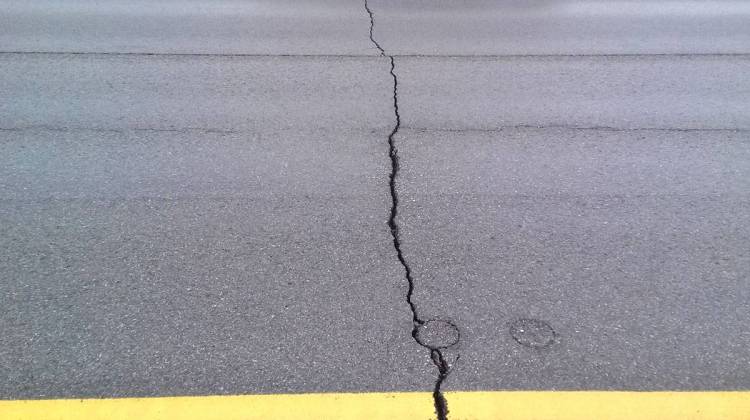 Cracking in asphalt on S.R. 25 in Cass County. INDOT says Fort Wayne, Ind.-based Brooks Construction Co. must remove and replace the three-mile stretch of highway or repay the $5 million the agency paid the company. - Indiana Department of Transporation
