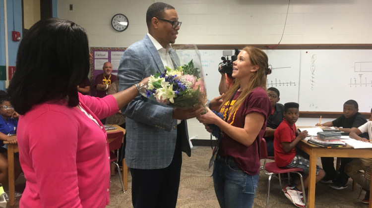 IPS Superintendent Lewis Ferebee surprised middle school teacher Alexandria Stewart at The Center for Inquiry School 70 during her math class Friday morning. - Carter Barrett/WFYI