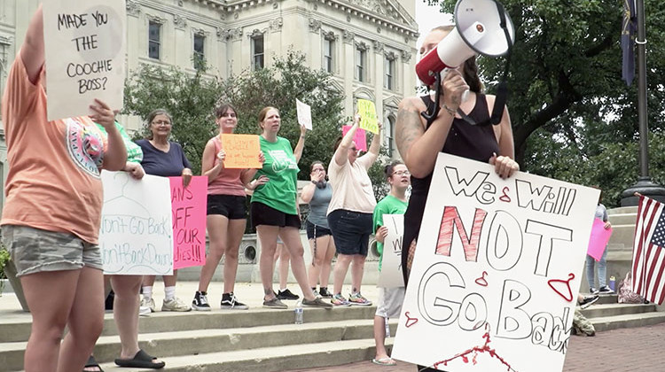 ozens of Hoosiers rallied outside the Statehouse to “keep the fire burning” in support of abortion rights on the day a special session of the legislature was supposed to begin. - Alan Mbathi/IPB News