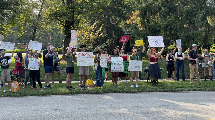 Protesters gathered at events across Indianapolis on Thursday to express their opposition to Indiana’s new abortion law.  - Darian Benson/WFYI