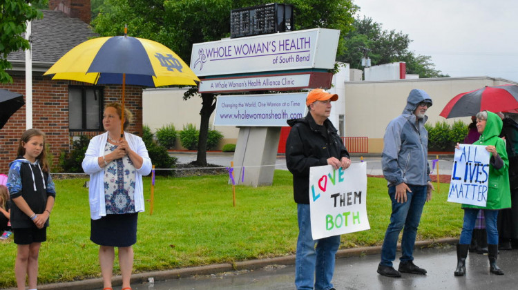 Anti-abortion activists demonstrate in front of the Whole Woman's Health Alliance clinic in South Bend. - Justin Hicks/IPB News