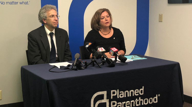 ACLU of Indiana Legal Director Ken Falk (left) and Planned Parenthood of Indiana and Kentucky CEO Christie Gillespie (right) discuss a federal judge halting Indiana's abortion reporting law. - Sarah Panfil/WFYI