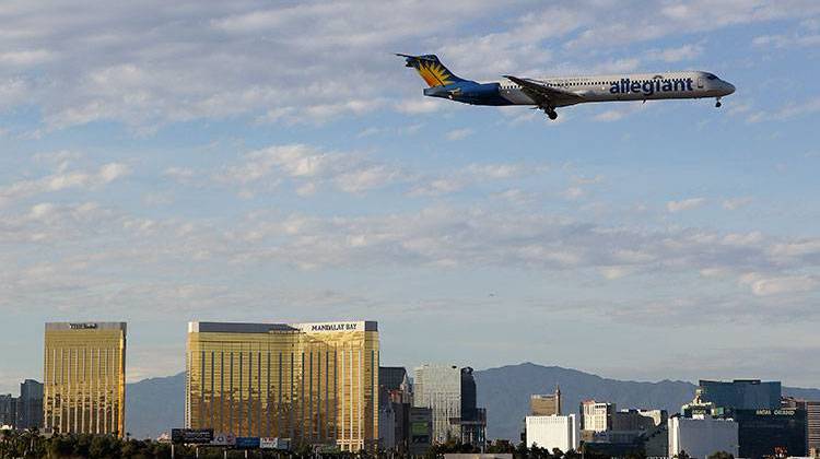 An Allegiant Air flight prepares to land at McCarran International Airport in Las Vegas. - AP Photo/Julie Jacobson
