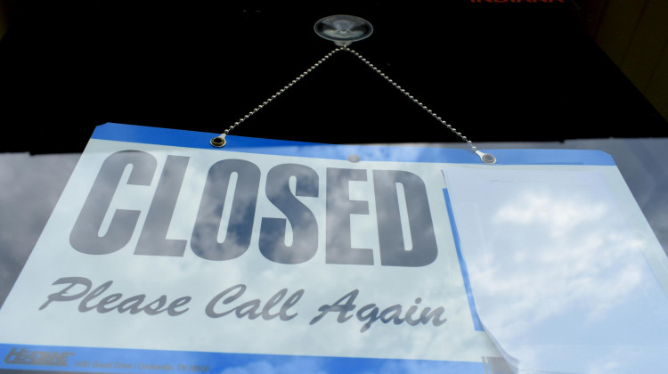 A WorkOne center in Knox, Indiana, displays a closed sign on the front door.  - Justin Hicks/IPB News