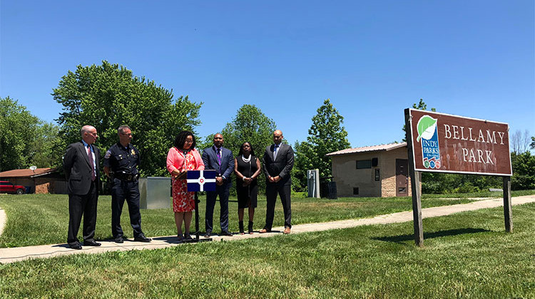The first Director of Community Violence Reduction, Shonna Majors, speaks at Bellamy Park about Indianapolis' holistic effort to fight violence and crime. - Sarah Panfil/WFYI