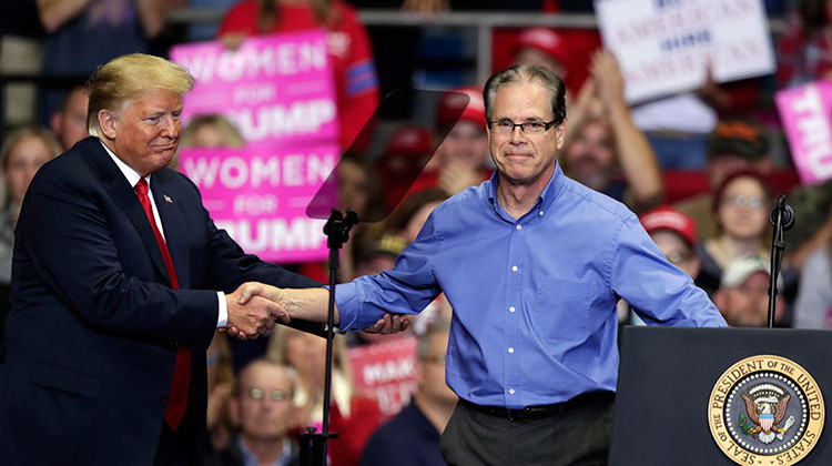 President Donald Trump greets Senate candidate Mike Braun at a campaign rally at the Allen County War Memorial Coliseum in Fort Wayne, Ind., Monday, Nov. 5, 2018.  - AP Photo/Michael Conroy