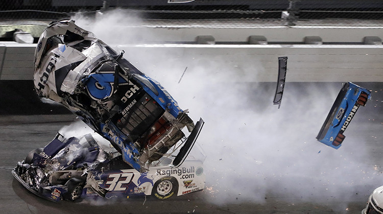 Ryan Newman (6) goes airborne after crashing into Corey LaJoie (32) during the NASCAR Daytona 500 auto race Monday, Feb. 17, 2020, at Daytona International Speedway in Daytona Beach, Fla. Sunday's running of the race was postponed by rain.  - AP Photo/Chris O'Meara