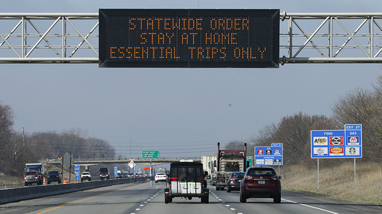 A highway sign in Carmel urges resident to stay home as the state ordered residents to remain at home except for essential activities to slow the spread of COVID-19, Wednesday, March 25, 2020. - AP Photo/Michael Conroy