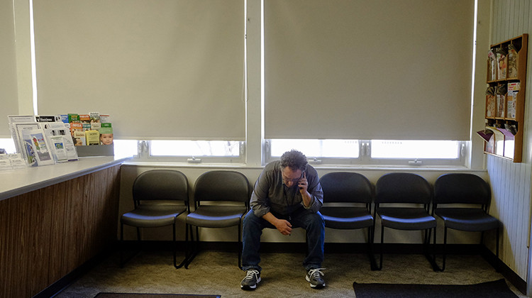 Decatur County's public health preparedness coordinator Sean Durbin listens to a conference call about the coronavirus, Thursday, April 2, 2020, in Greensburg, Ind. Decatur County is among three neighboring southeastern Indiana counties that all have confirmed COVID-19 cases among the highest per-capita rates in the country. - AP Photo/Darron Cummings