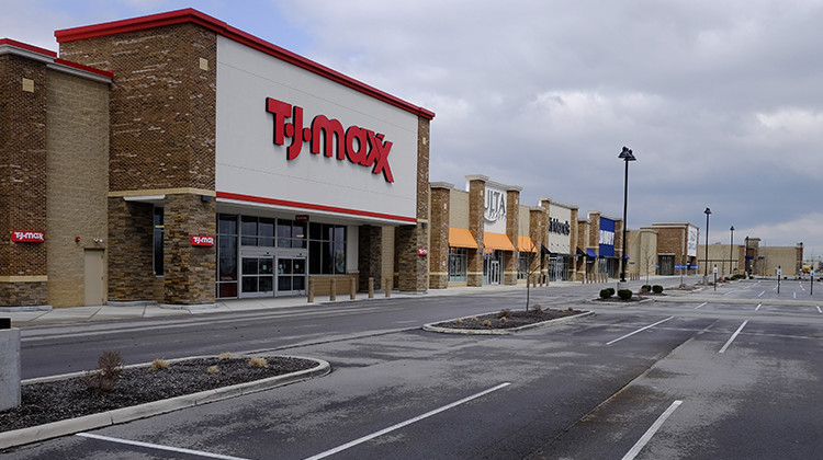 An empty parking lot is seen at retail stores are closed, Wednesday, April 15, 2020, in Whitestown, Ind. Evidence of the devastating impact of the coronavirus on the U.S. economy has been steadily emerging, and the evidence is ominous. Sales at retail stores and restaurants plunged in March by the most on records dating back almost 30 years. - AP Photo/Darron Cummings