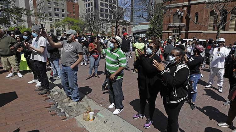 Protesters gather outside of the City County Building, Thursday, May 7, 2020, in Indianapolis. The crowd was protesting the fatal shooting Wednesday evening by an Indianapolis Metropolitan Police Officer.  - AP Photo/Darron Cummings