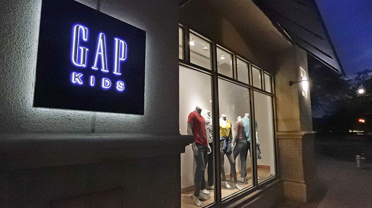 FILE - This Aug. 23, 2018, file photo shows a window display at a Gap Kids clothing store in Winter Park, Florida. Gap is being sued for refusing to pay rent for stores temporarily closed during the coronavirus pandemic.  - AP Photo/John Raoux, File