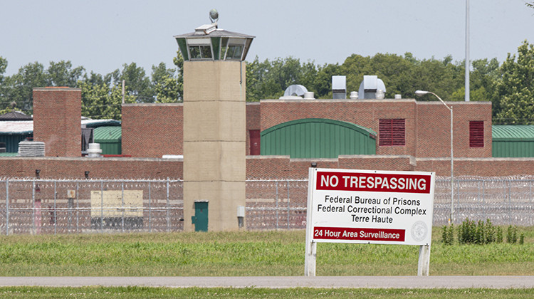 The entrance to the federal prison in Terre Haute, Ind., is seen Wednesday, July 15, 2020. - AP Photo/Michael Conroy