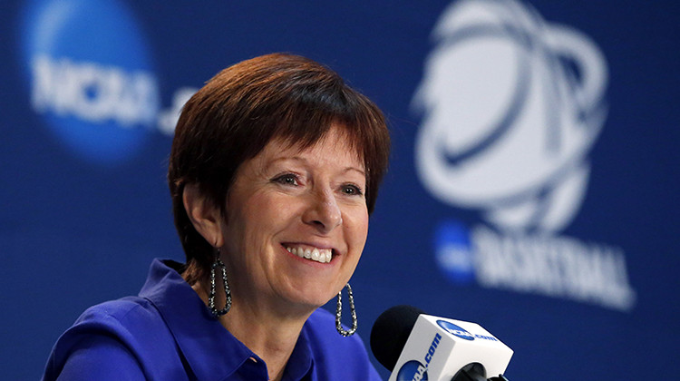 FILE - In this March 27, 2015, file photo, Notre Dame head coach Muffet McGraw listens during a news conference after a women's college basketball regional semifinal game against against Stanford in the NCAA Tournament in Oklahoma City. - AP Photo/Sue Ogrocki, File