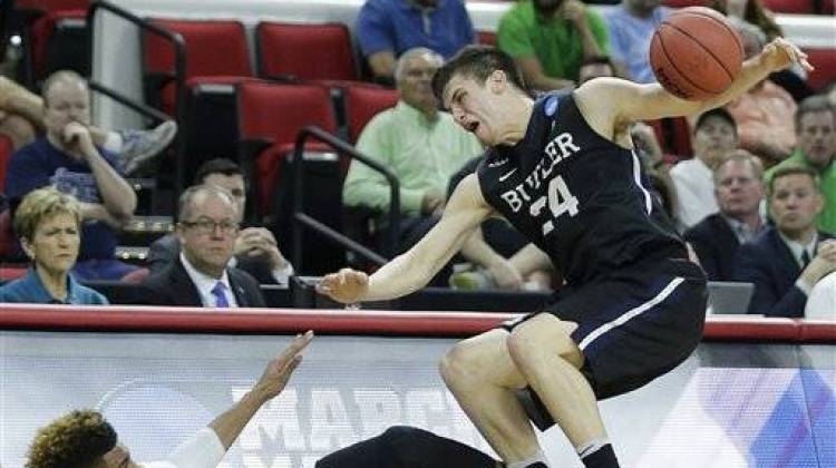 Butler guard Kellen Dunham (24) collides with Texas Tech forward Justin Gray (5) during a first-round men's college basketball game in the NCAA Tournament, Thursday, March 17, 2016, in Raleigh, N.C.  - Chuck Burton, The Associated Press