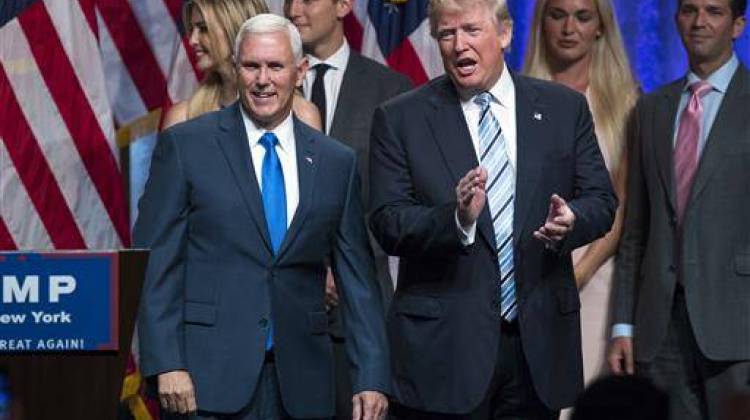 Republican presidential candidate Donald Trump, right, introduces Gov. Mike Pence, R-Ind., during a campaign event to announce Pence as the vice presidential running mate on, Saturday, July 16, 2016, in New York.  - AP Photo/Evan Vucci