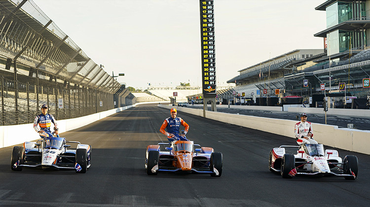 Marco Andretti, right, poses, with Scott Dixon, of New Zealand, center and Takuma Sato, of Japan, during the front row photos session for the Indianapolis 500 auto race at Indianapolis Motor Speedway in Indianapolis, Monday, Aug. 17, 2020. Andretti won the pole for Sunday's race.  - AP Photo/Michael Conroy