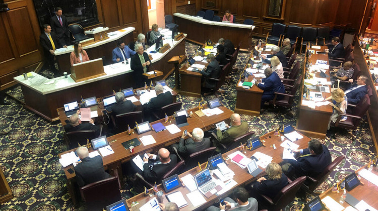 FILE - In this March 11, 2020 file photo, Rep. Don Lehe, R-Brookston, speaks during an Indiana House session at the Statehouse in Indianapolis. Indiana lawmakers are preparing to move much of their 2021 legislative session activity out of the Statehouse over coronavirus concerns. A joint House-Senate committee on Wednesday, Sept. 9 endorsed a plan aimed at allowing the 100-member House hold its floor sessions and committee meetings in the auditorium and conference rooms in a state office buildin - AP Photo/Tom Davies File