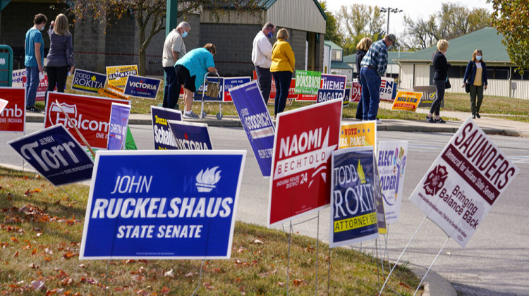 Voters wait in line to cast their ballot in the 2020 Presidential election during early voting in Noblesville, Ind.Wednesday, Oct. 14, 2020.  - AP Photo/Michael Conroy, File