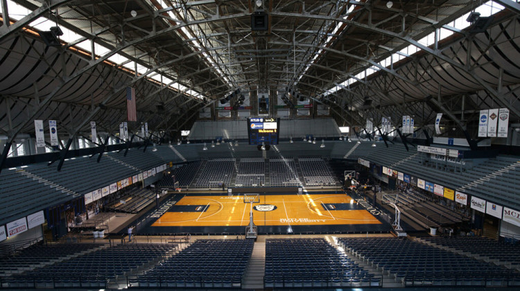 FILE - In this March 30, 2010, file photo, light shines through the windows onto the basketball court at Butler University's Hinkle Fieldhouse in Indianapolis.  - AP Photo/AJ Mast, File
