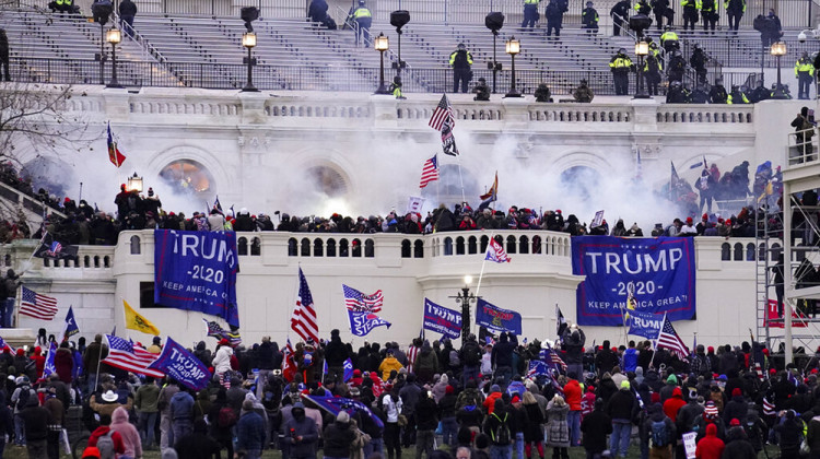 Violent protesters, loyal to President Donald Trump, storm the Capitol, Wednesday, Jan. 6, 2021, in Washington. It's been a stunning day as a number of lawmakers and then the mob of protesters tried to overturn America's presidential election, undercut the nation's democracy and keep Democrat Joe Biden from replacing Trump in the White House.  - AP Photo/John Minchillo