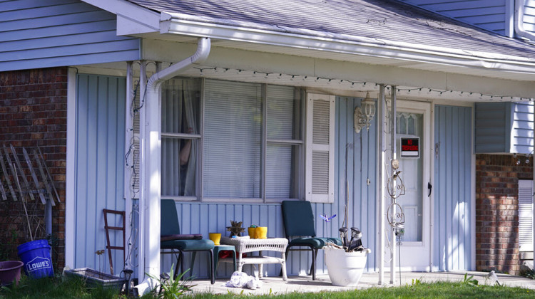 The home of 19-year-old Brandon Scott Hole, the suspected shooter who opened fire with a rifle at a FedEx facility, is seen in Indianapolis, Friday, April 16, 2021. At a news conference Friday, Deputy Police Chief Craig McCartt also confirmed the gunman's identity as Hole. McCartt said Hole was a former employee of the company and last worked for FedEx in 2020.  - AP Photo/Michael Conroy