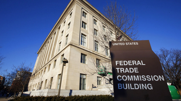 FILE - This Jan. 28, 2015, file photo, shows the Federal Trade Commission building in Washington. The Federal Trade Commission and six states, including Indiana, are suing Frontier Communications for not delivering the internet speeds it promised customers and charging them for better, more expensive service than they actually got. - AP Photo/Alex Brandon, File