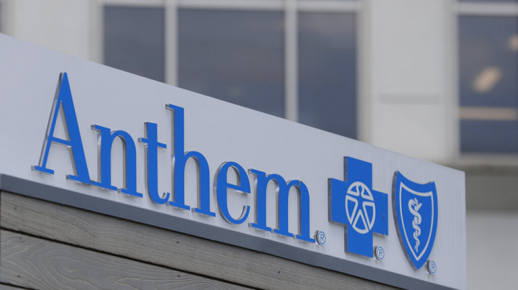 FILE - In this May 14, 2019, file photo signage on the outside of the corporate headquarters building of health insurance company Anthem is shown in Indianapolis. Anthem topped second-quarter expectations, Wednesday, July 21, 2021, even though the health insurer’s profit tumbled as patients who hunkered down last year at the start of the COVID-19 pandemic started seeking care again. - AP Photo/Michael Conroy, File
