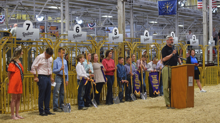 Indiana Gov. Eric Holcomb speaks at the groundbreaking for the Indiana State Fairgrounds’ new Fall Creek Pavilion, which will replace the century-old Swine Barn on Friday, Aug. 6, 2021 in Indianapolis. The project is part of a historic building spree soon to begin in Indiana after state legislators set aside more than $1 billion for construction endeavors.  - AP Photo/Casey Smith